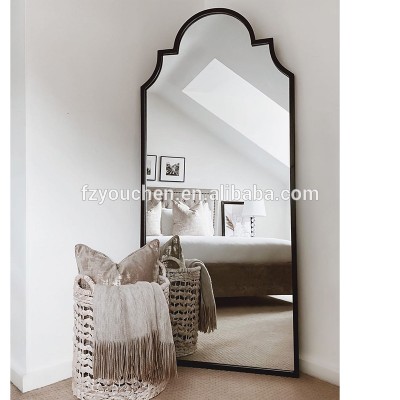 Black industrial arched metal mirror